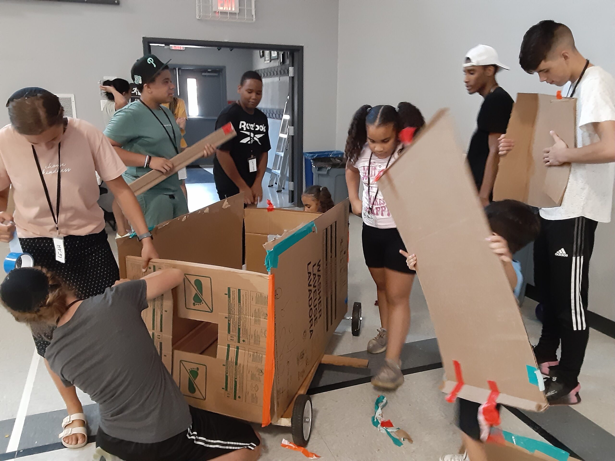 kids playing with boxes