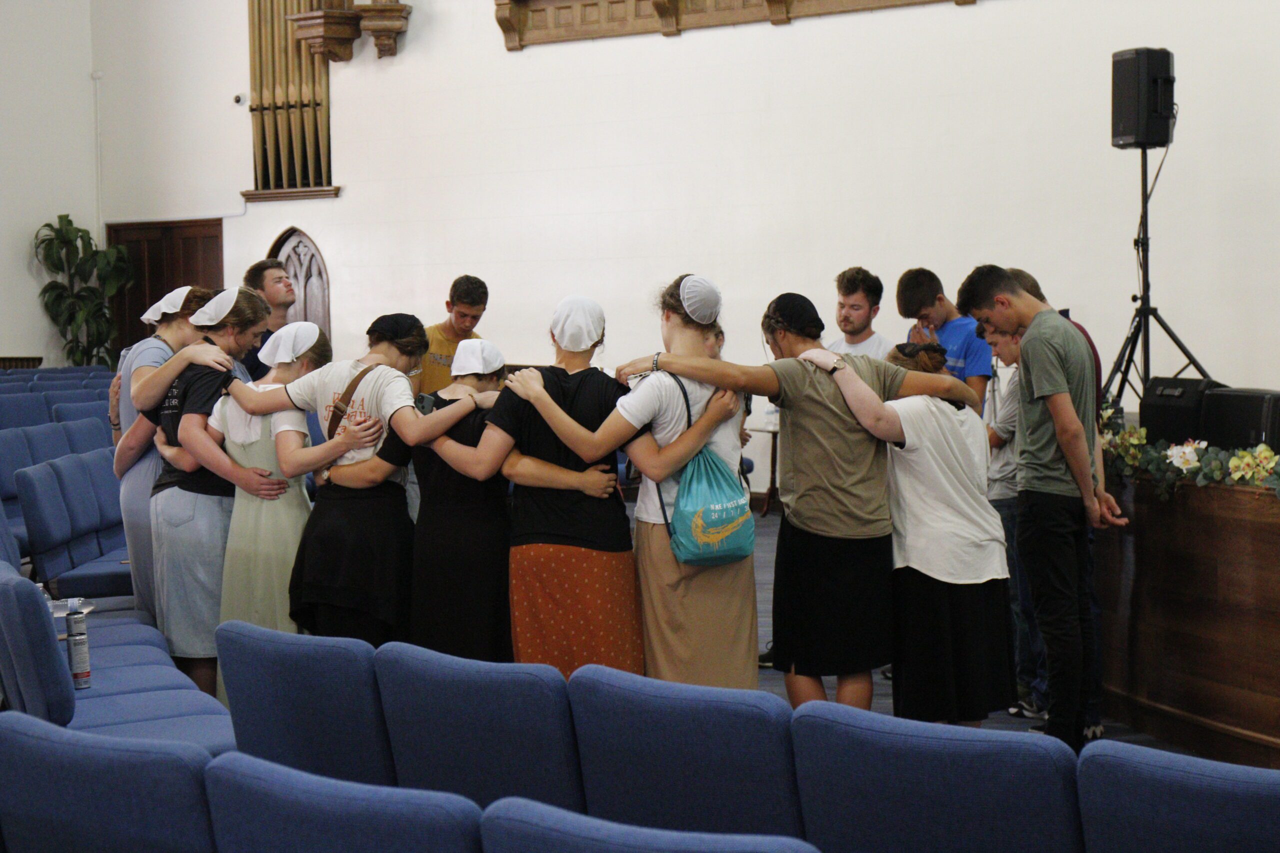people praying together